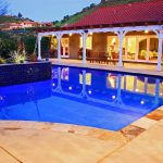 Inground Pool Overlooking Hill by Pacific Outdoor Living