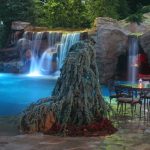 Pool with Rock Waterfall and Lights by https://www.flickr.com/photos/cavinesslandscape/7065360801